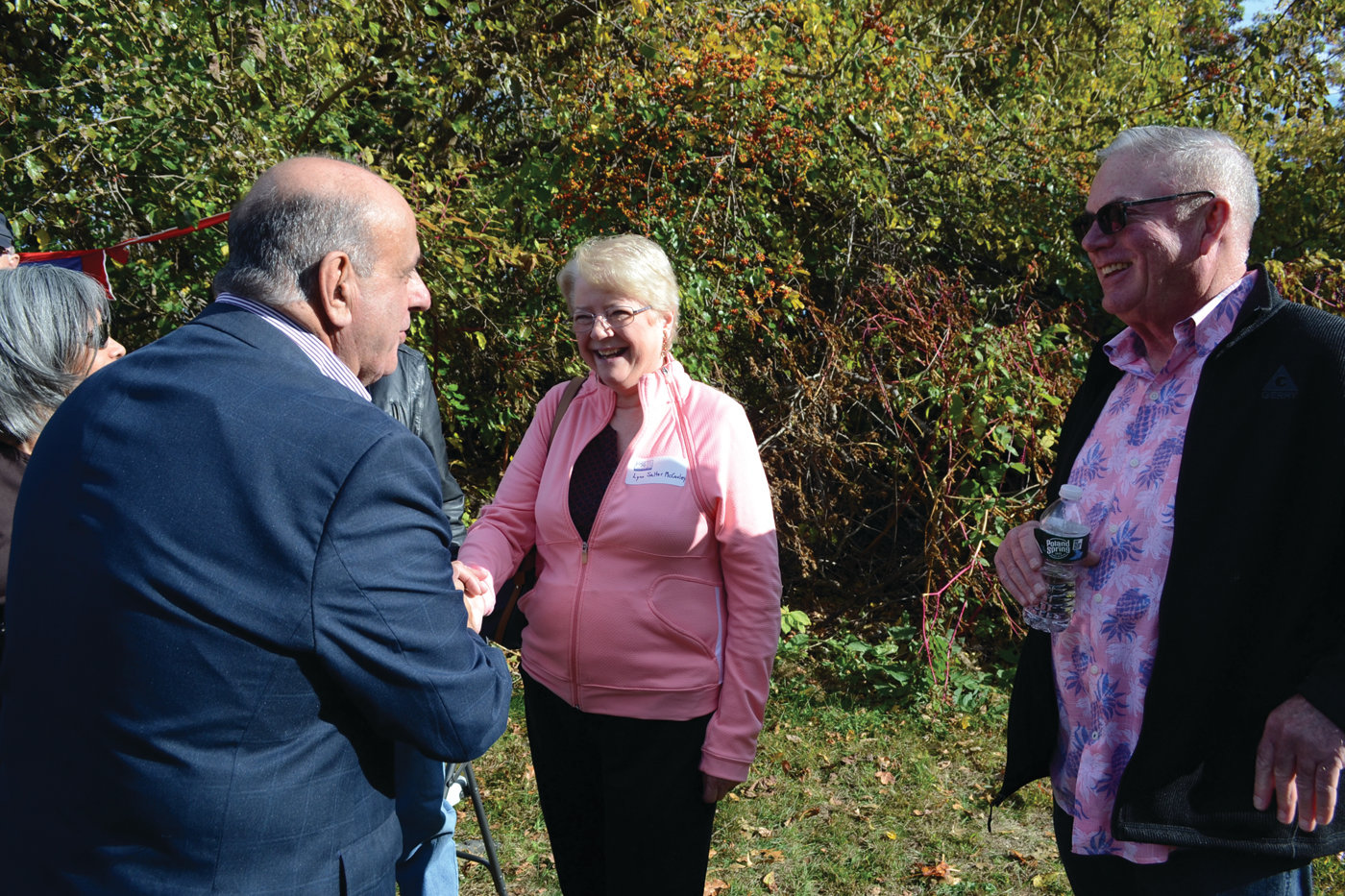 NAMESAKE: Lynn Salter McCauley, granddaughter of George B. Salter, for whom the park was named, took part in the celebration of the renewed park on Saturday. She is with Mayor Joseph Solomon and Warwick State Rep. Joseph McNamara.